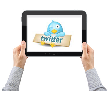 Holding a Tablet with Twitter background