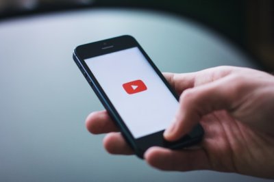 picture of a phone with the youtube logo