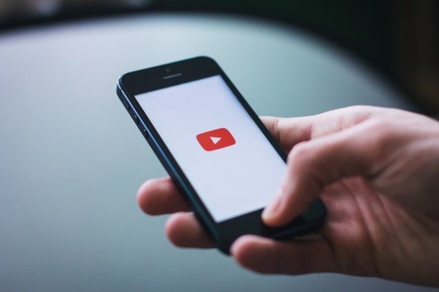 picture of a phone with the youtube logo